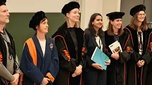 AdeKUS-docent promoveert in België