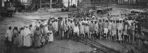 Photograph of indentured Indian labourers at Spring Garden Buildings. Jamaica, 1880. Catalogue reference: CO 137/497/29 folio 519 Photograph of indentured Indian labourers at Spring Garden Buildings. Jamaica, 1880. Catalogue reference: CO 137/497/29 folio 519